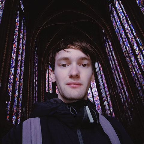 Photo of me at the Sainte-Chapelle in Paris, France